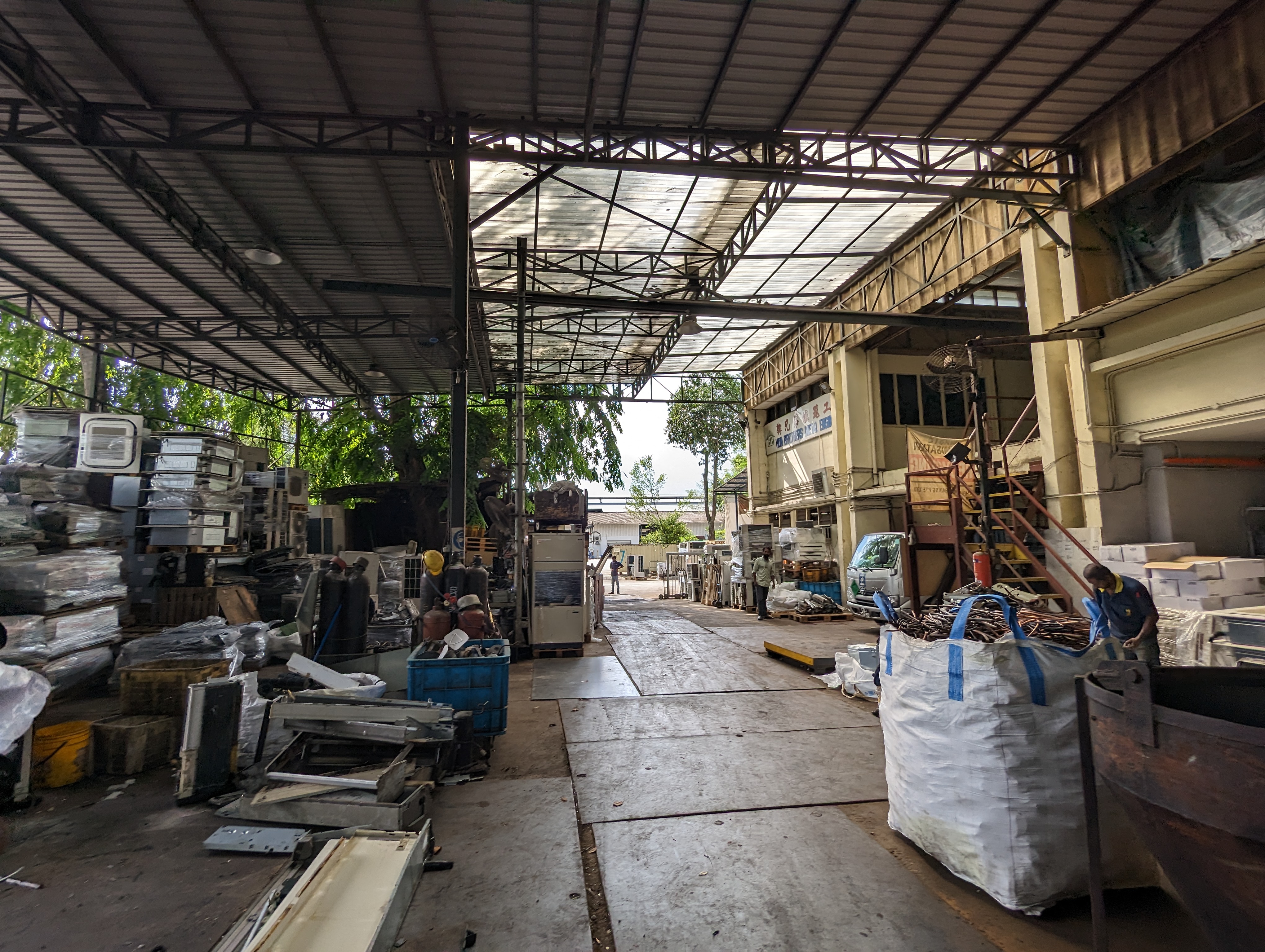 Cheng Hwa processes more than 60,000 air conditioners (split and variable refrigerant flow systems) each year. They control a quarter to a third of the air conditioner scrapping market in Singapore. Photo: Tilden Chao, 2023.